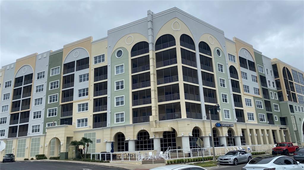 a front view of a building with glass windows