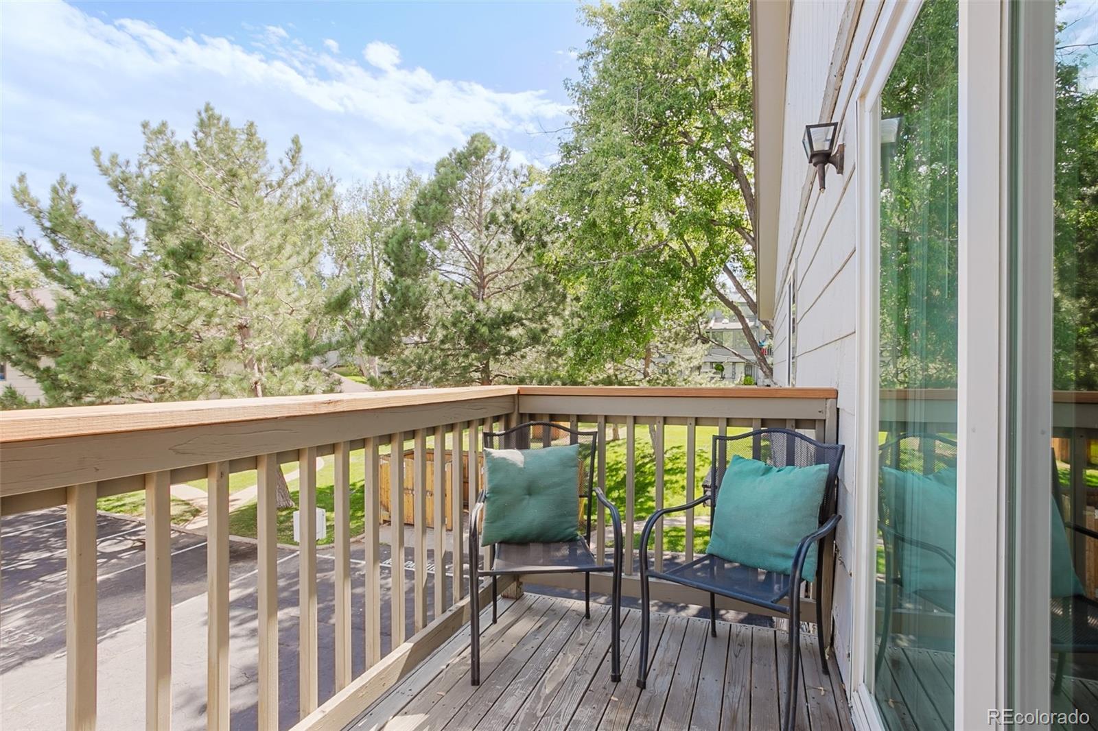 a view of balcony with furniture