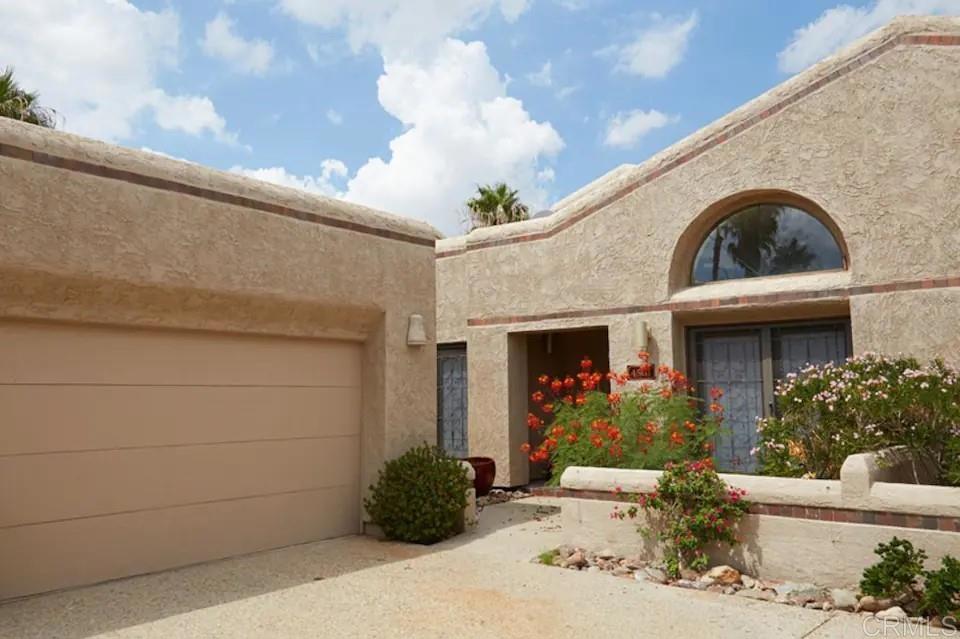 a view of outdoor space yard and front view of a house