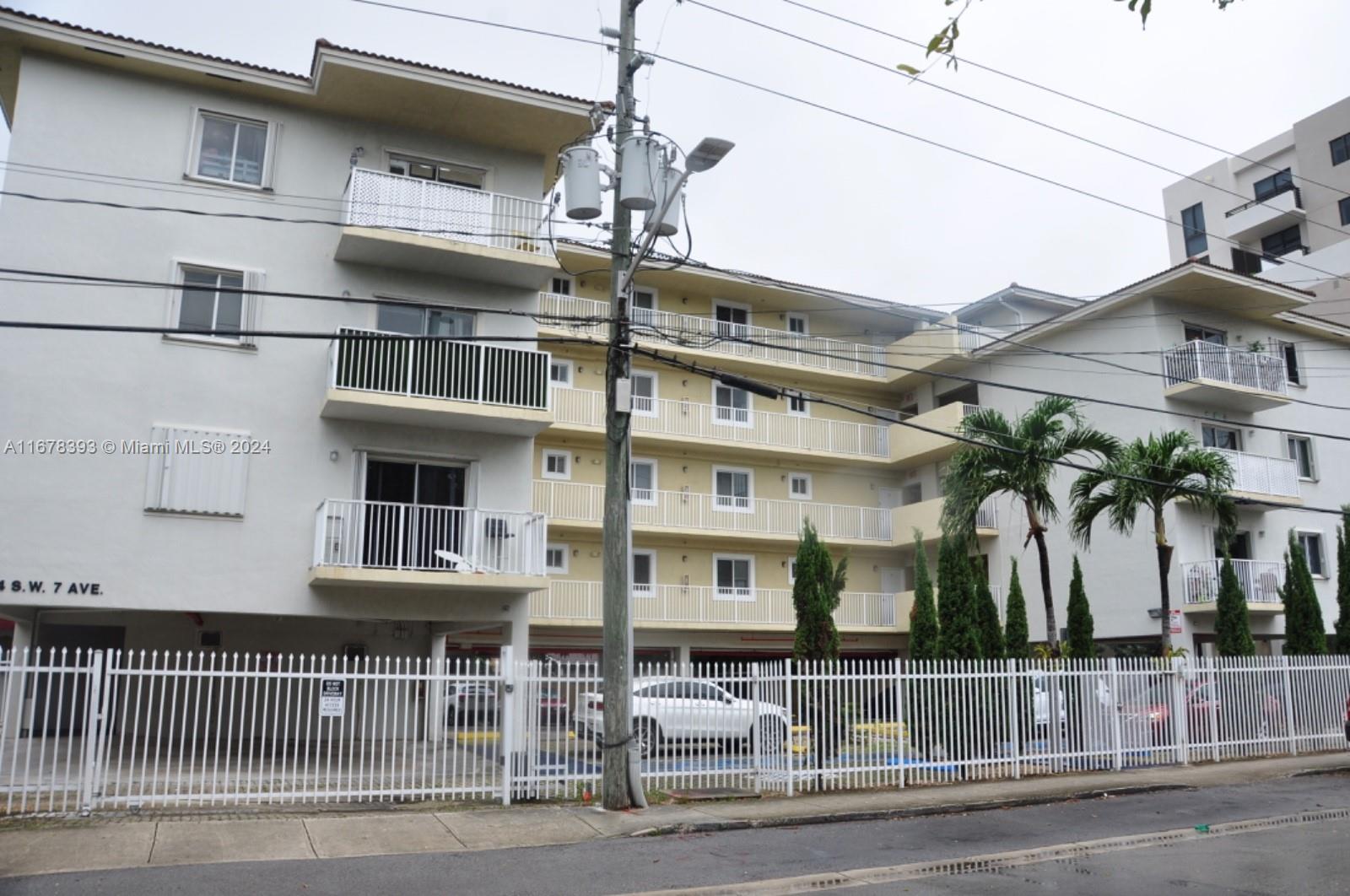 a view of a building and a street