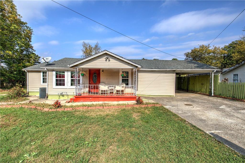 front view of a house with a yard