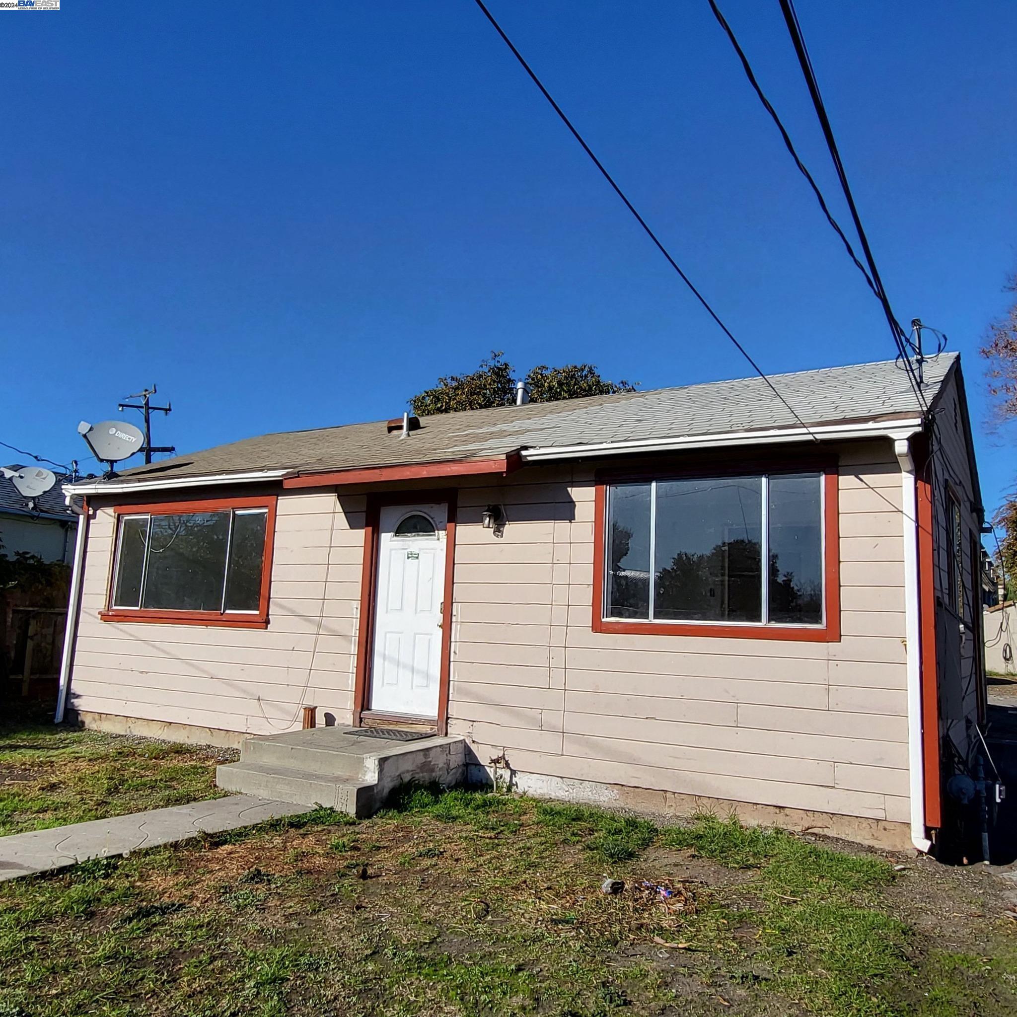 a front view of a house with garage