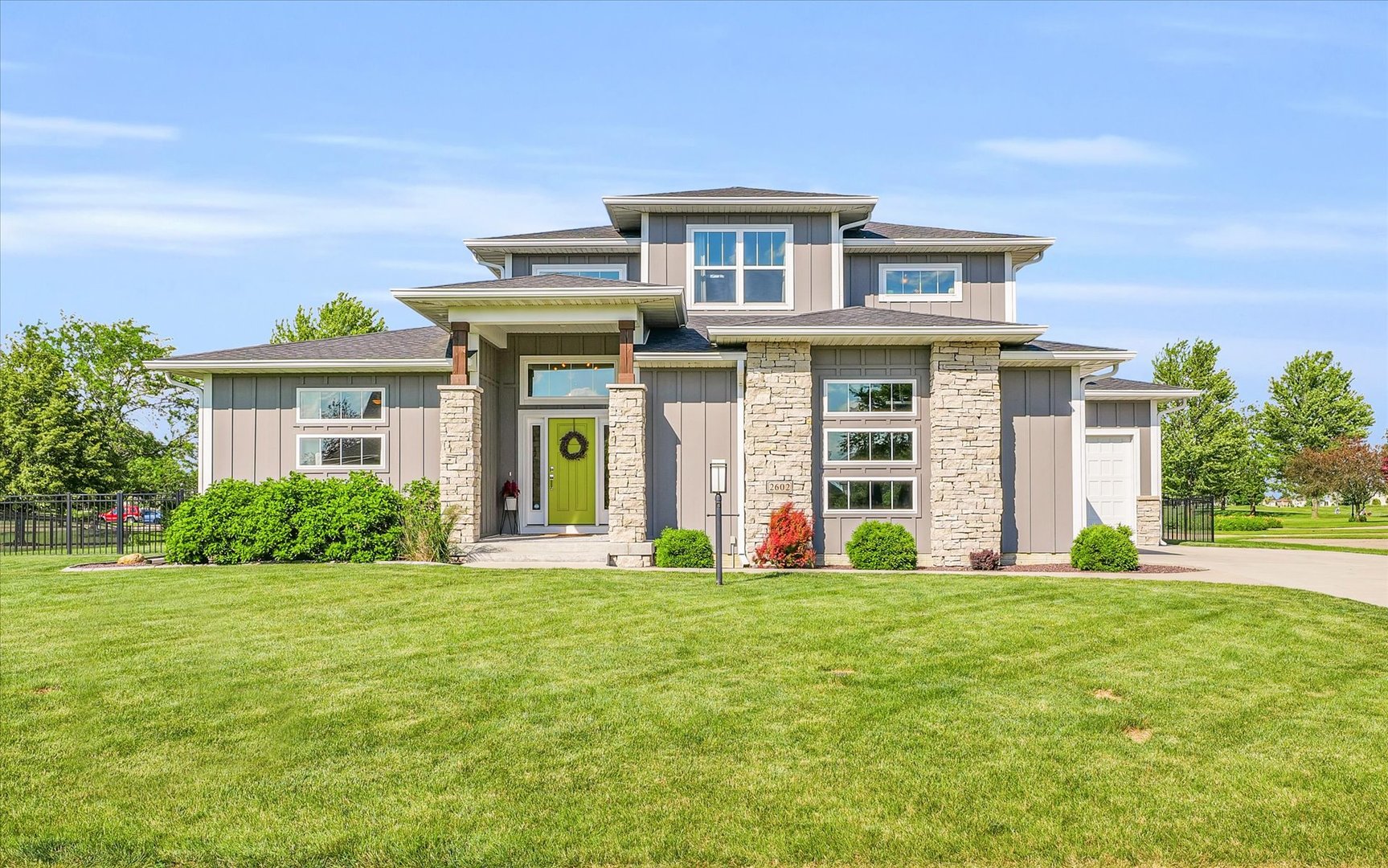 a front view of a house with a yard