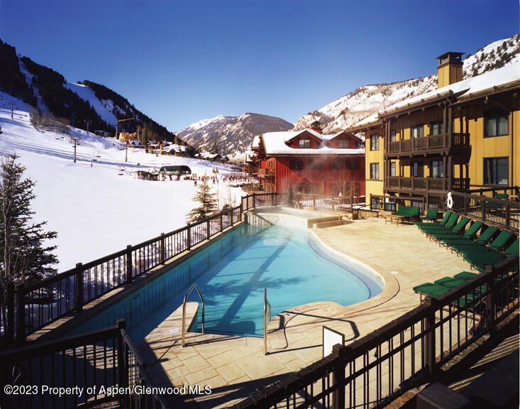 a view of outdoor space swimming pool and seating