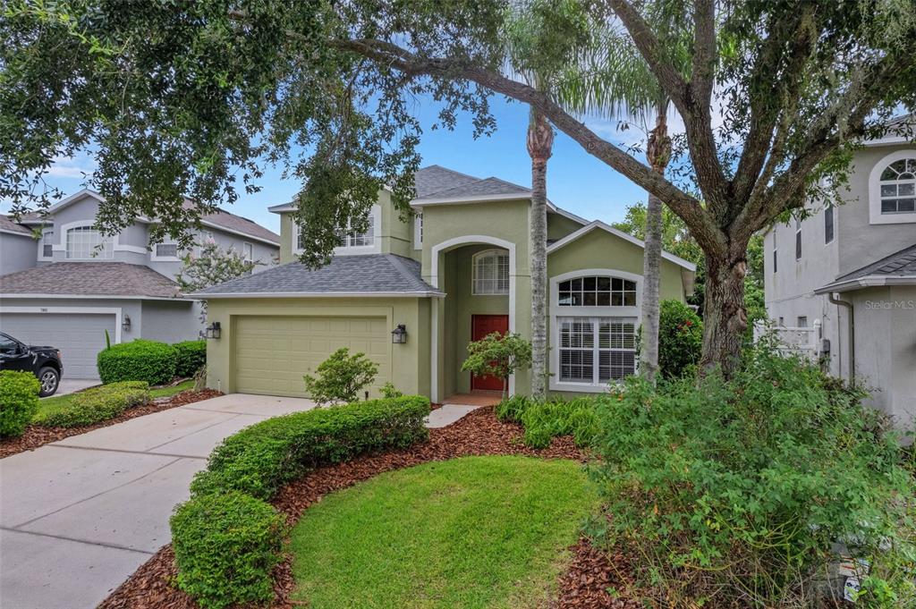 front view of a house with a yard