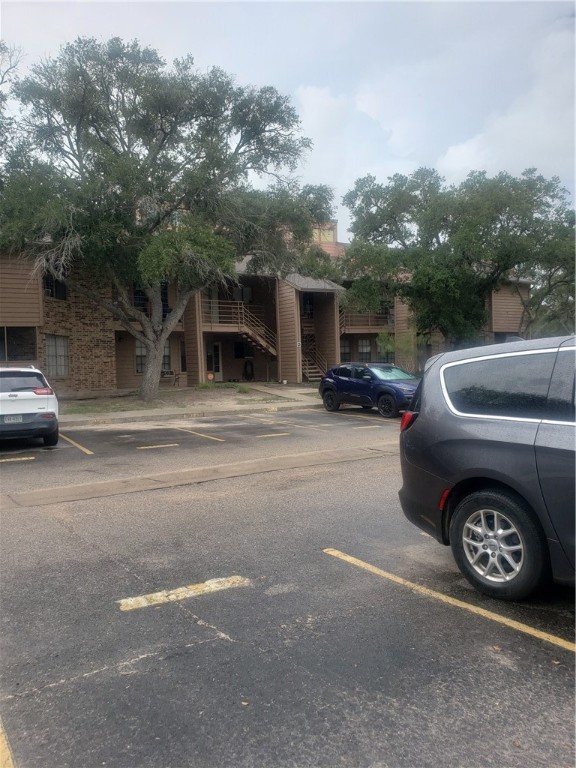 a car parked in front of a house