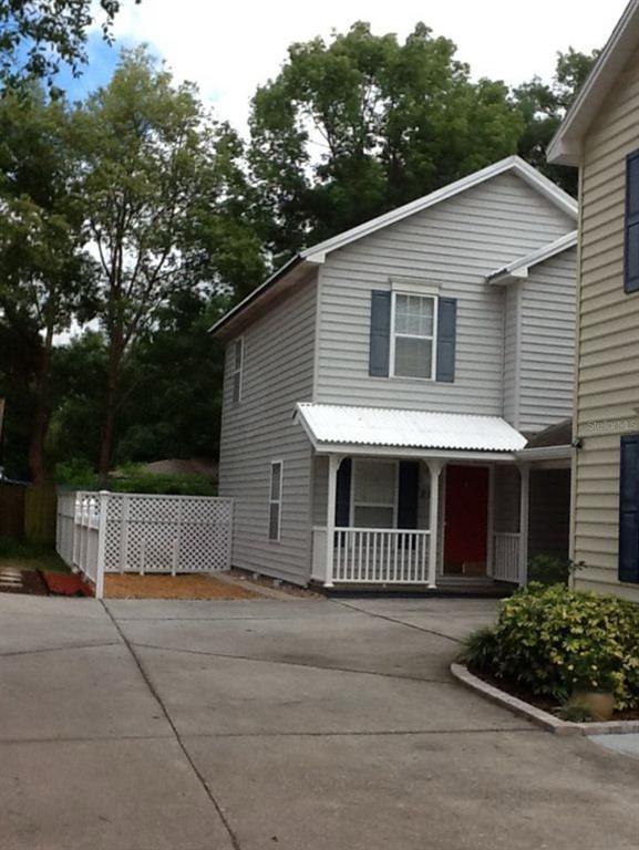 a front view of a house with garage