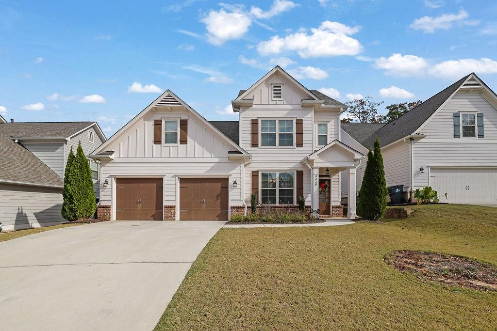 a front view of a house with a yard