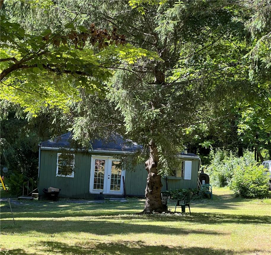 a view of a house with a swimming pool