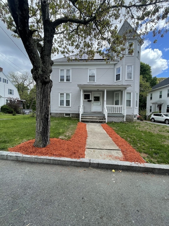 a view of outdoor space yard and front view of a house