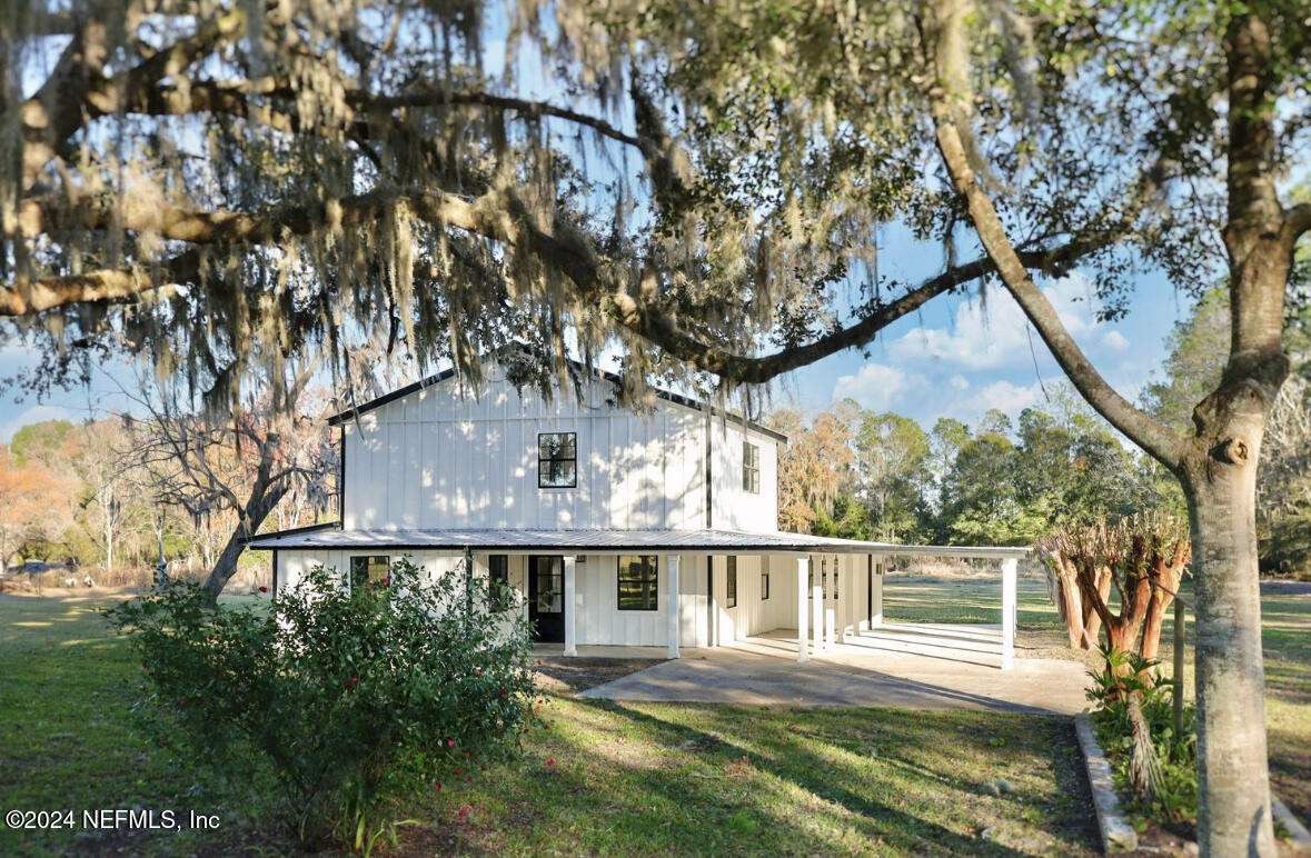 front view of house with a small yard