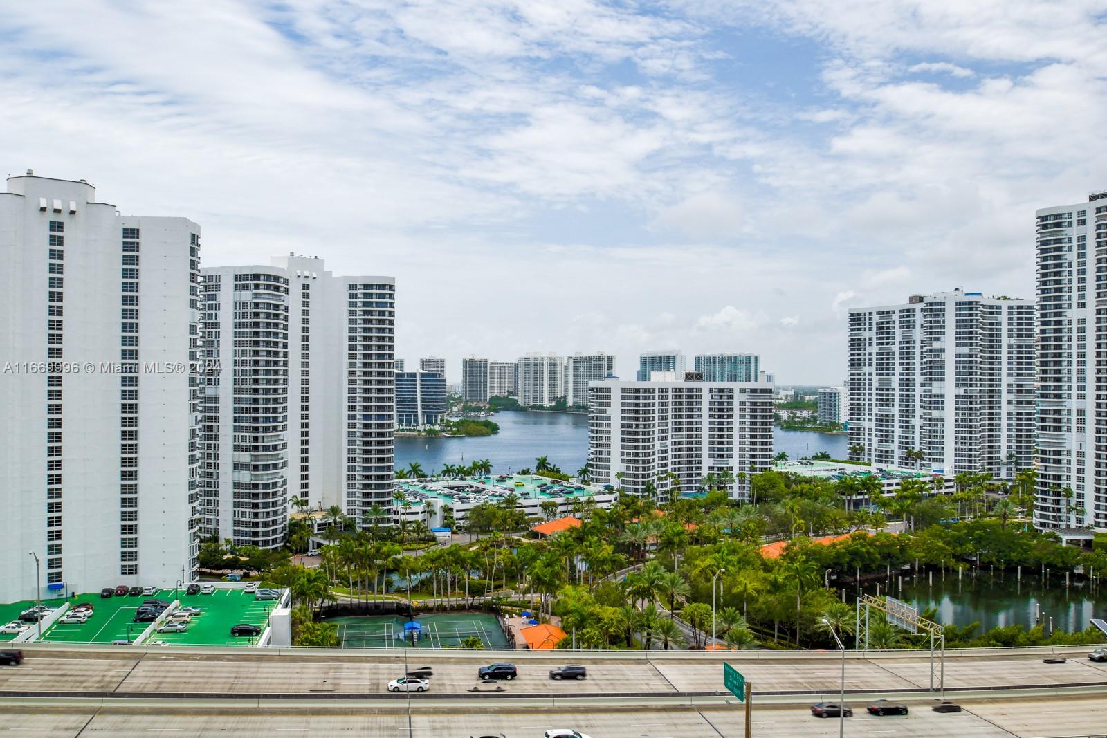 a view of a city with tall buildings