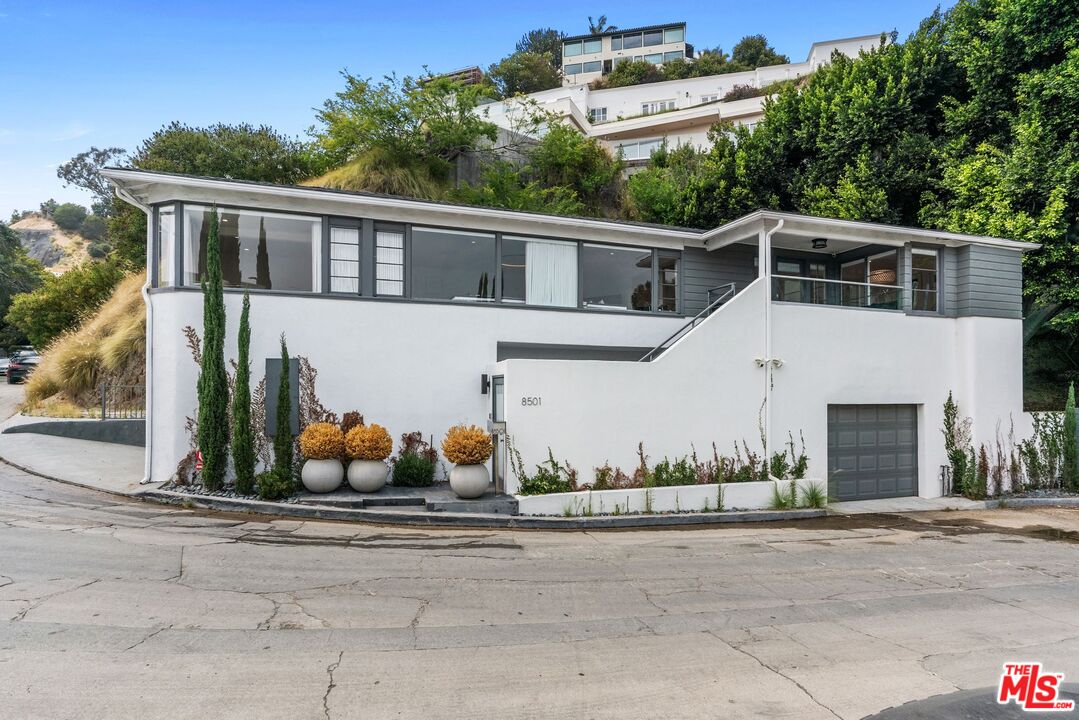 a house view with a outdoor space