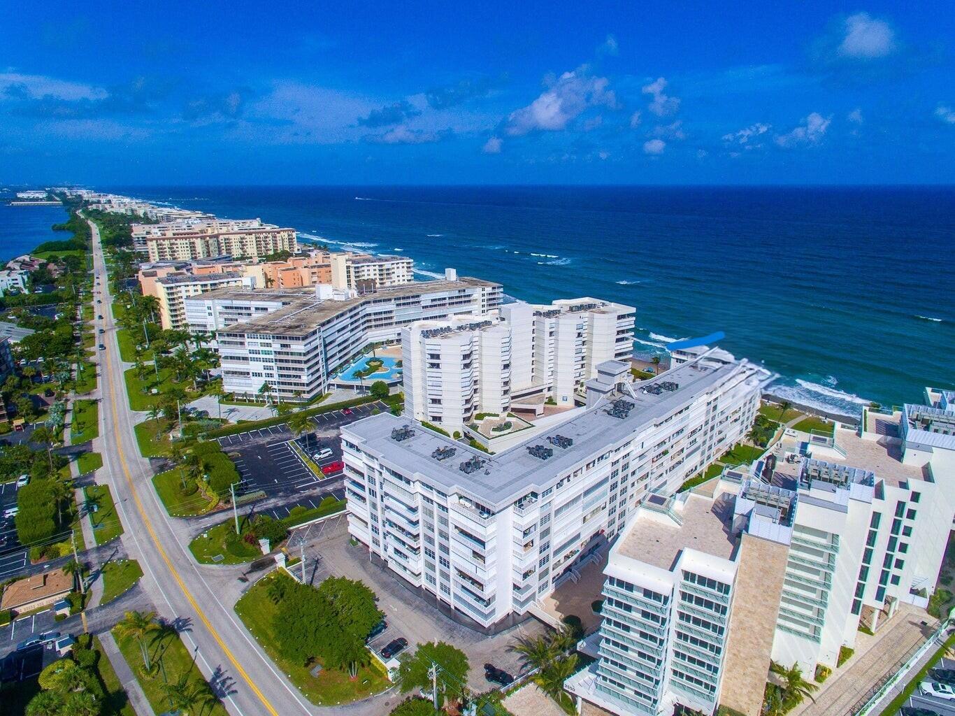 a view of a city with an ocean view