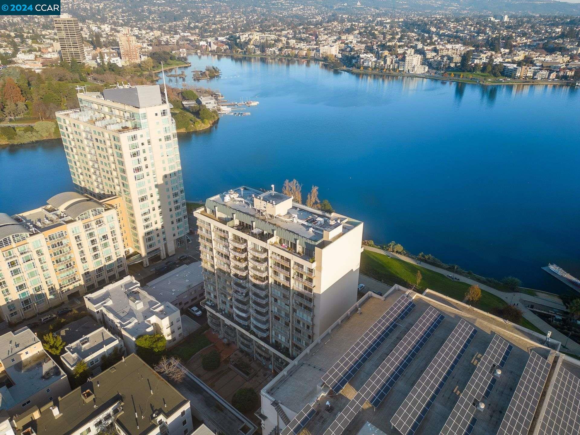 an aerial view of a residential houses with outdoor space