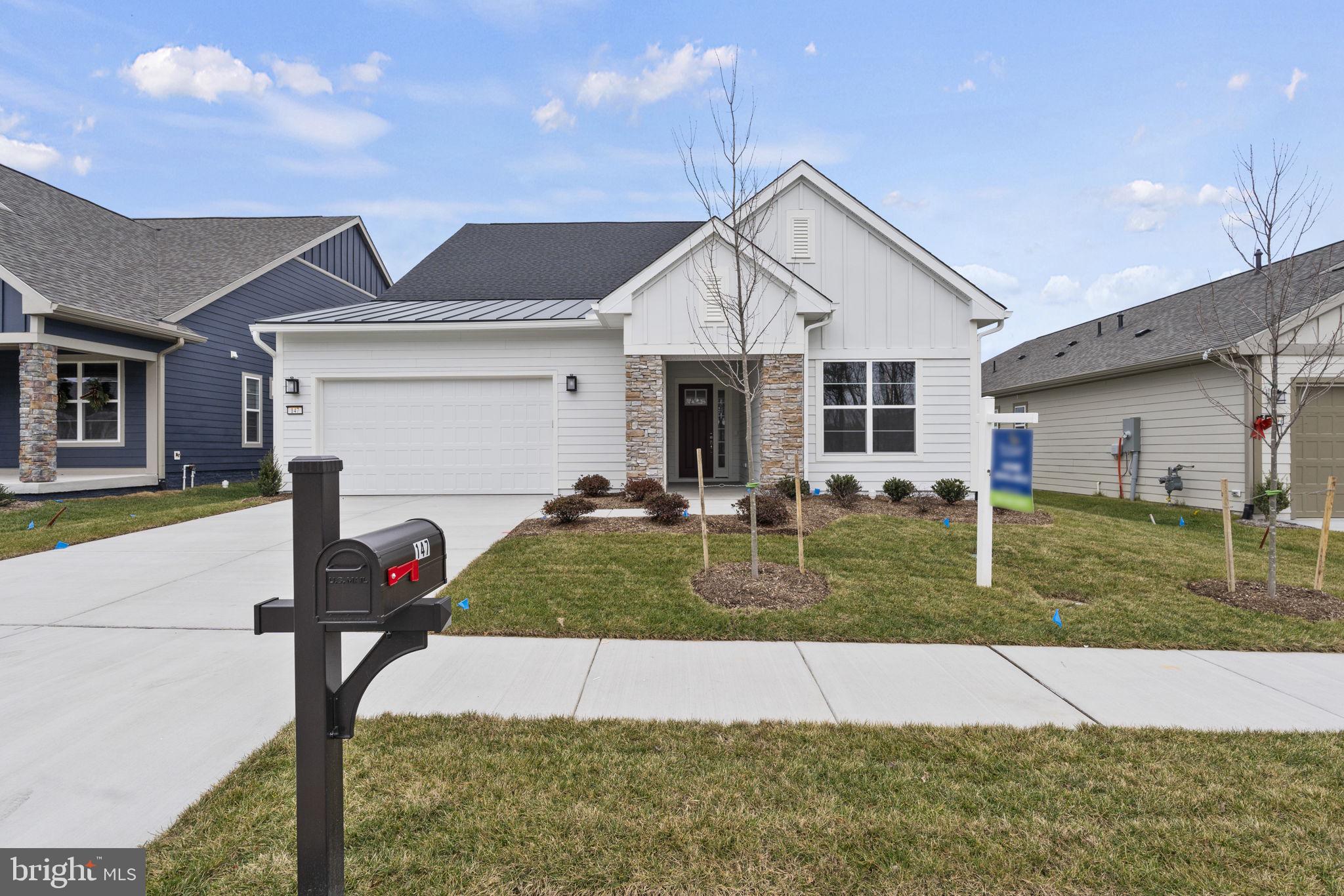 a view of a yard in front of a house