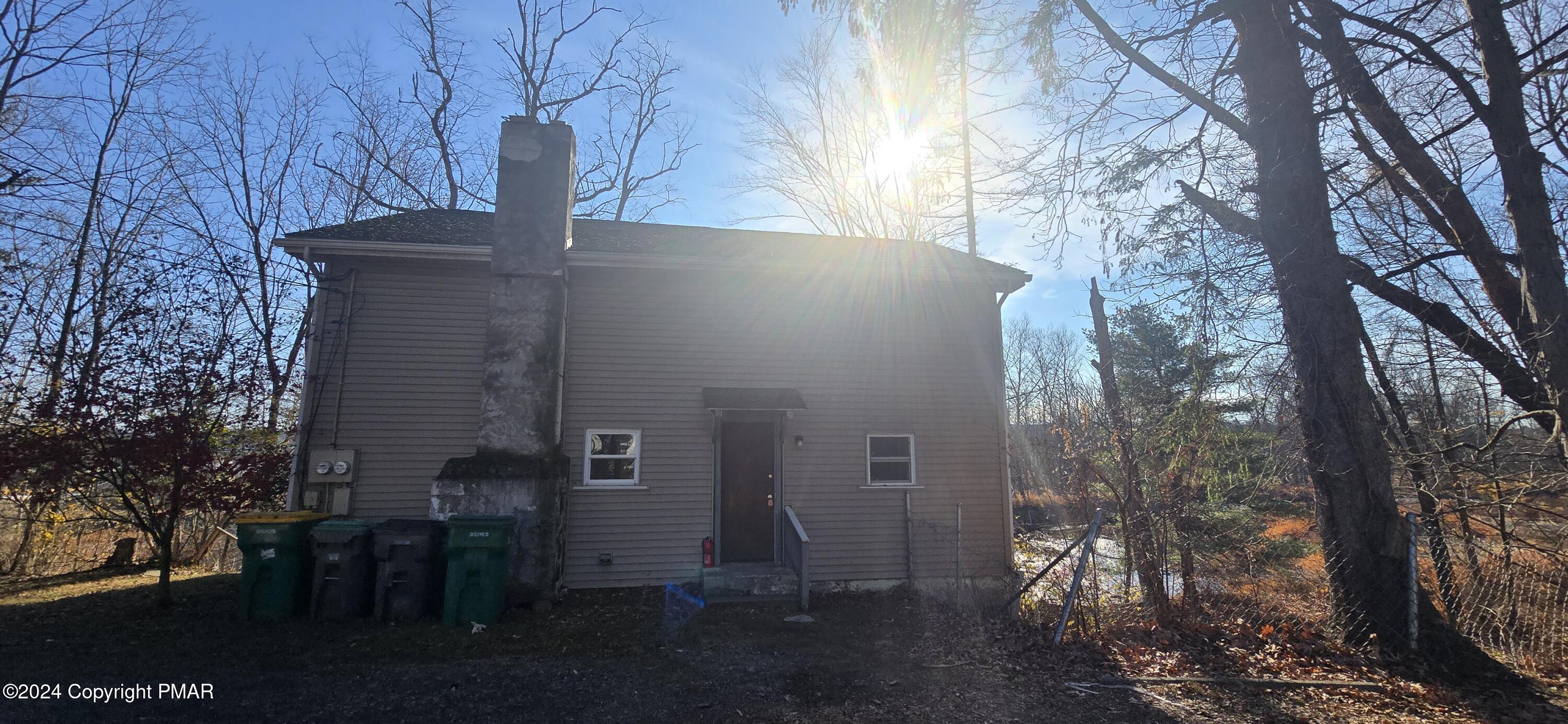 a view of backyard of house