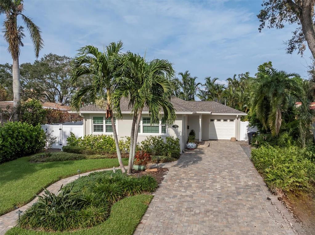 front view of a house with a yard