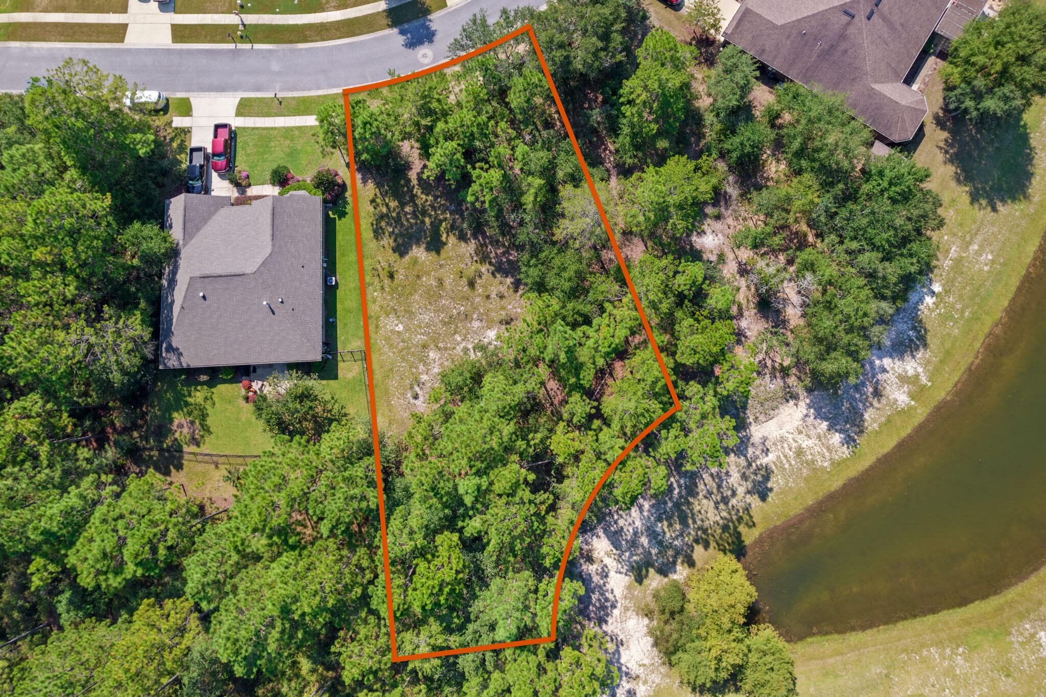 an aerial view of a house with a garden