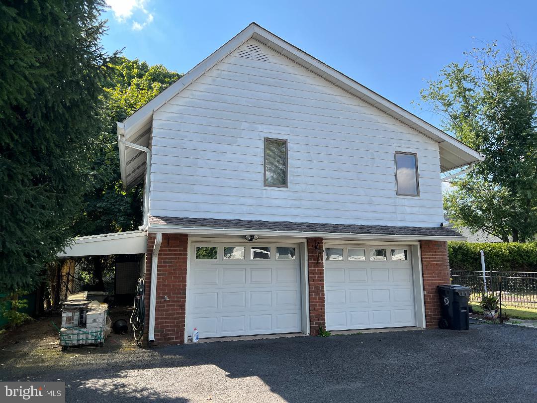 a front view of a house with a garage