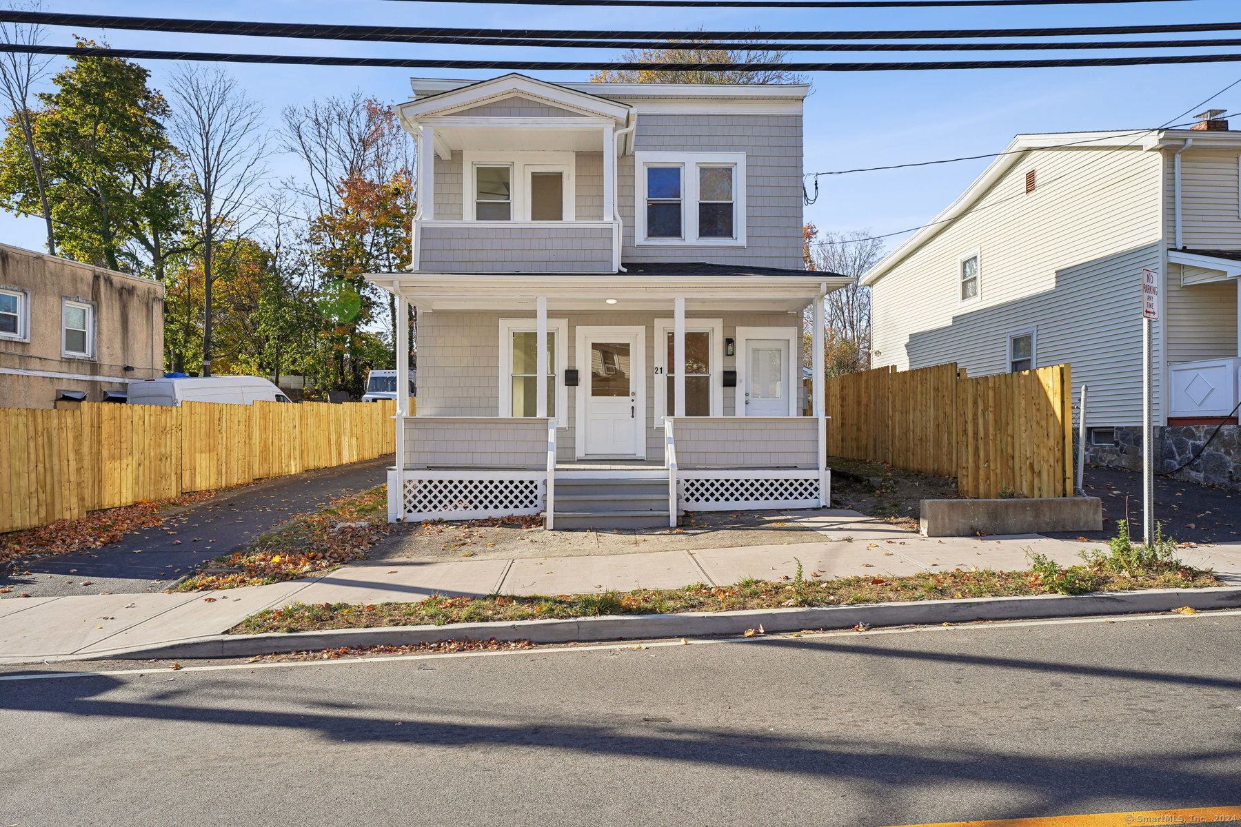 a view of a house with a street