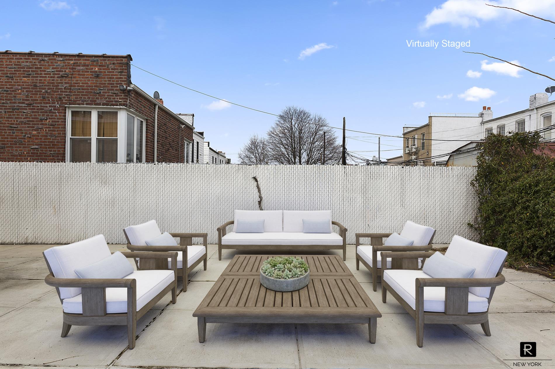 a patio with patio a couch and chairs