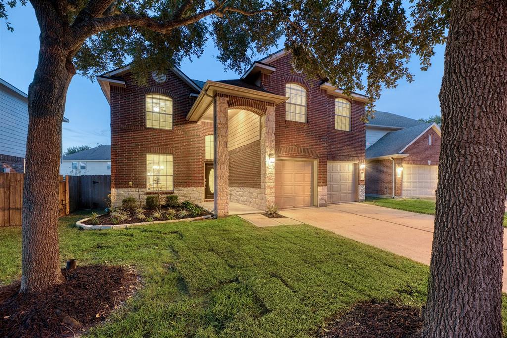 Welcome to 25806 Orchard Knolls Lane! Discover this stunning two-story home in Cinco Ranch, boasting exceptional curb appeal.