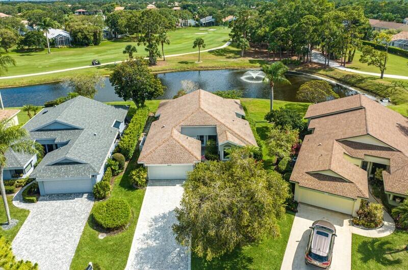 an aerial view of a house with a garden