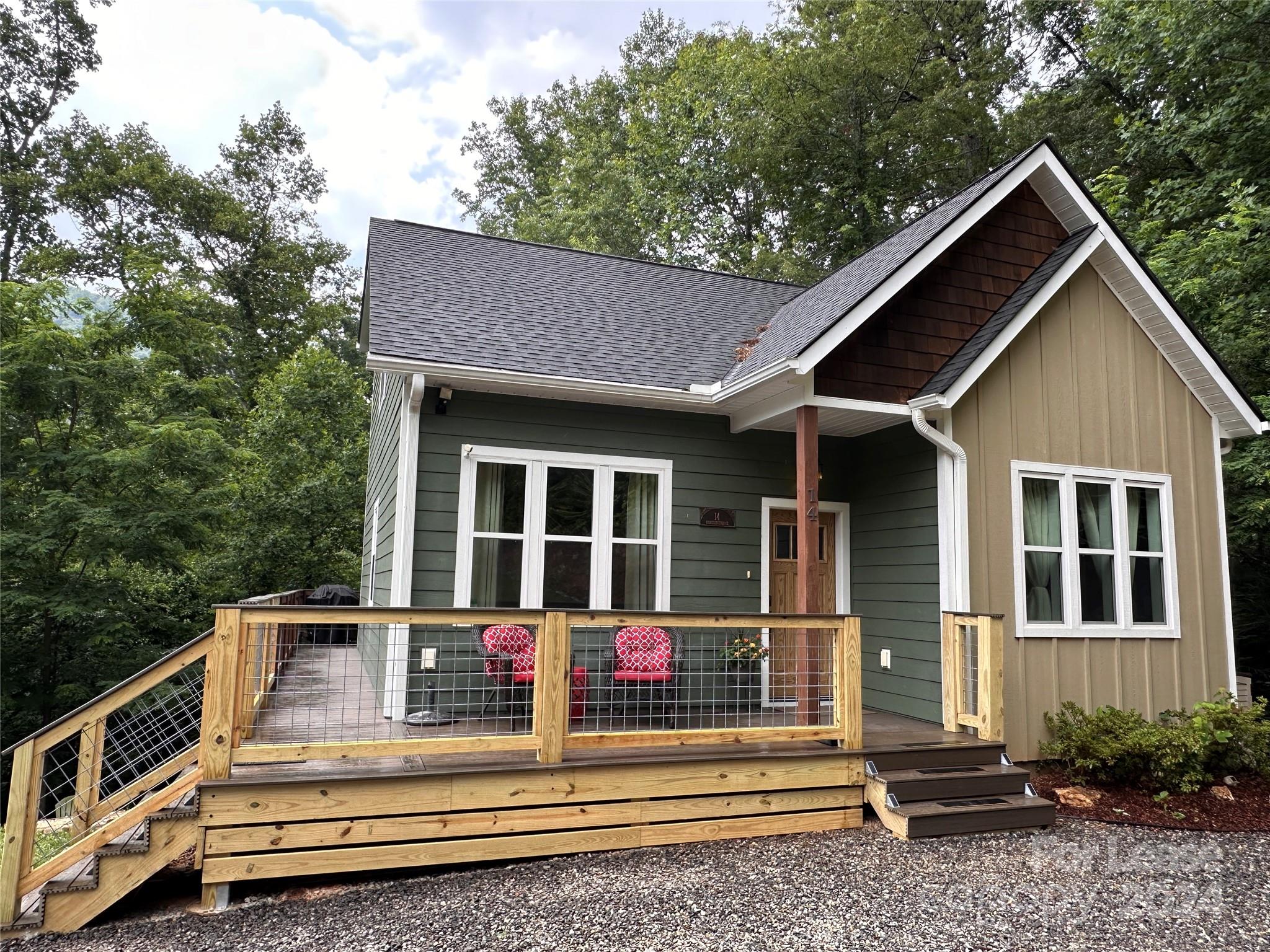 a front view of a house with a porch