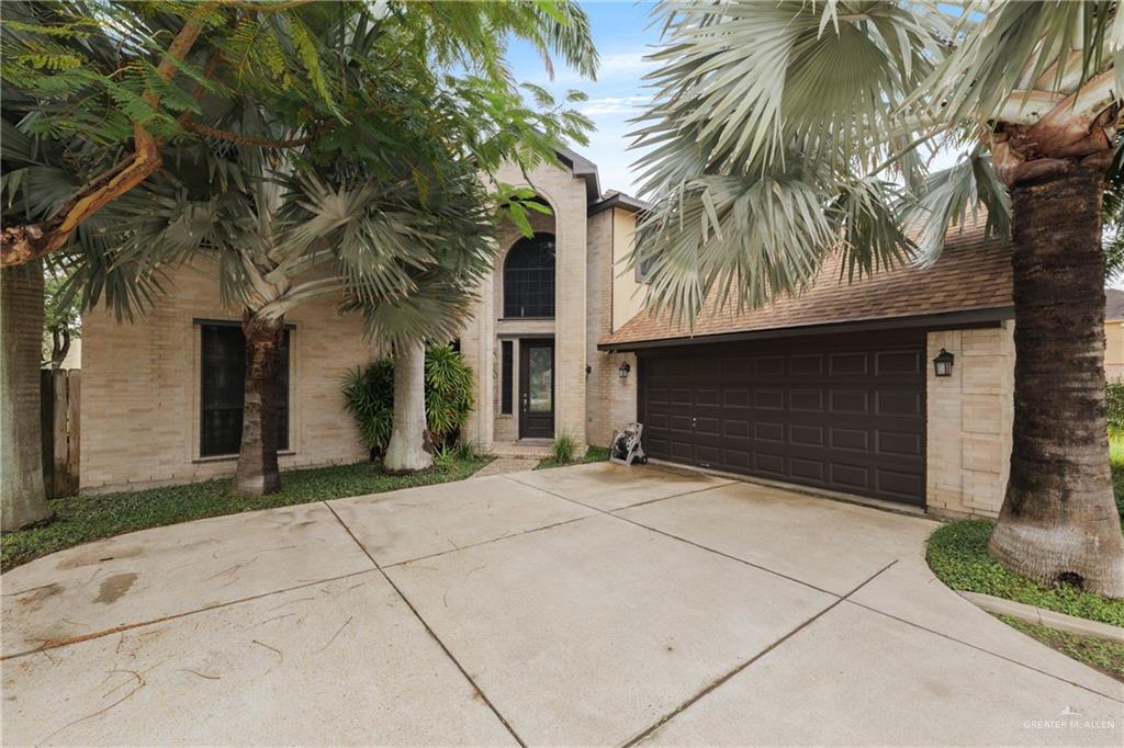 a house with a tree in front of it