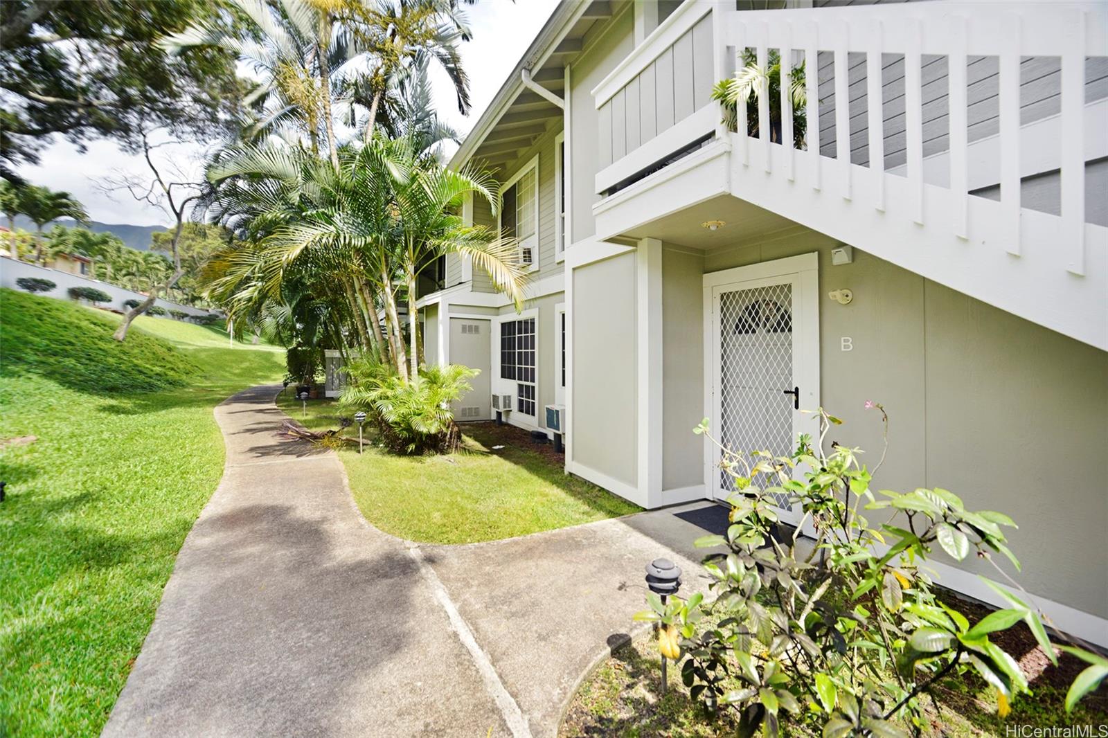 a view of a back yard of the house