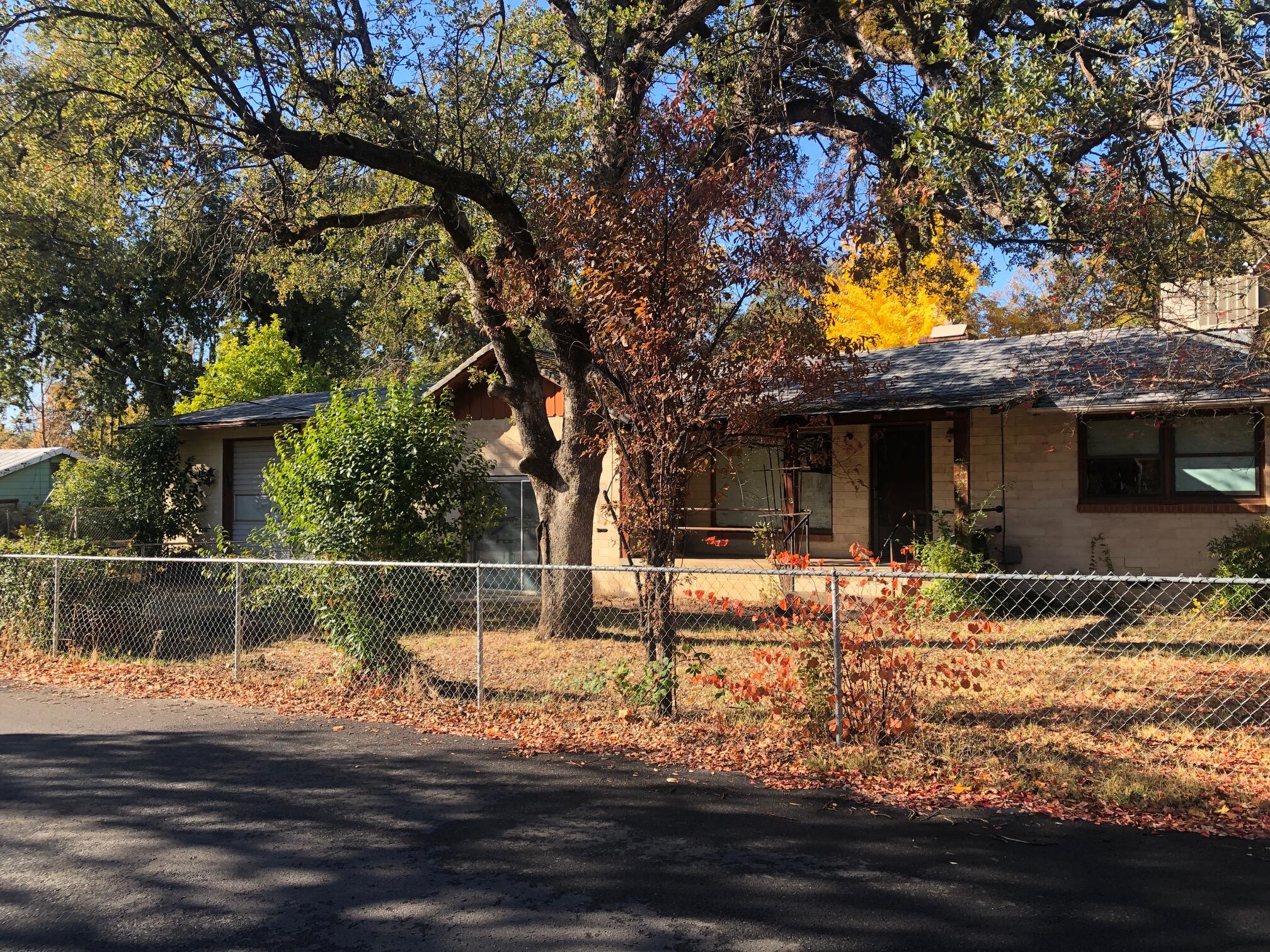 a front view of a house with swimming pool