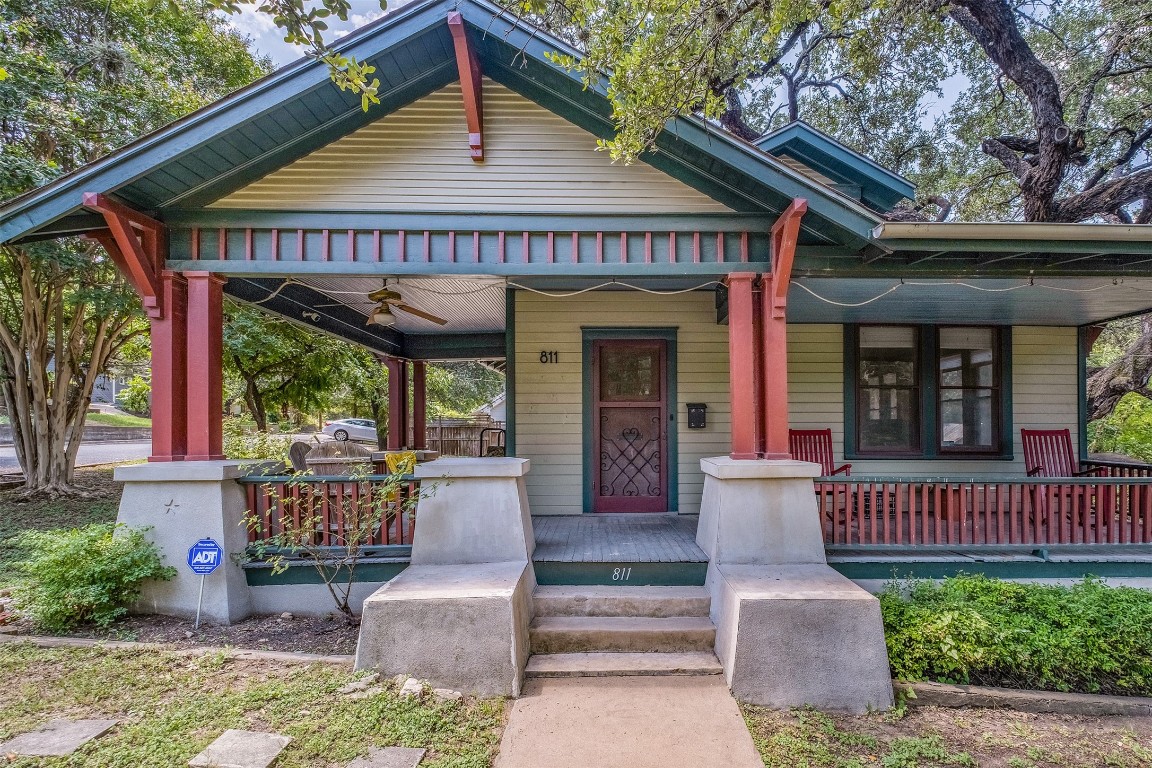 a view of a house with porch and sitting area