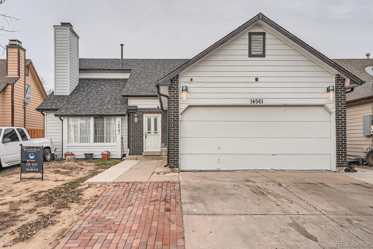 a view of a house with a patio