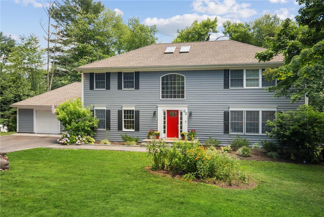 Welcome to 60 Morningside Dr. This light filled spacious center hall colonial is the perfect place to call home.