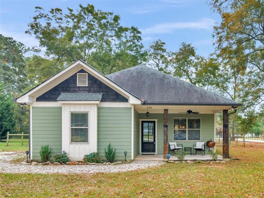 front view of a house with a yard