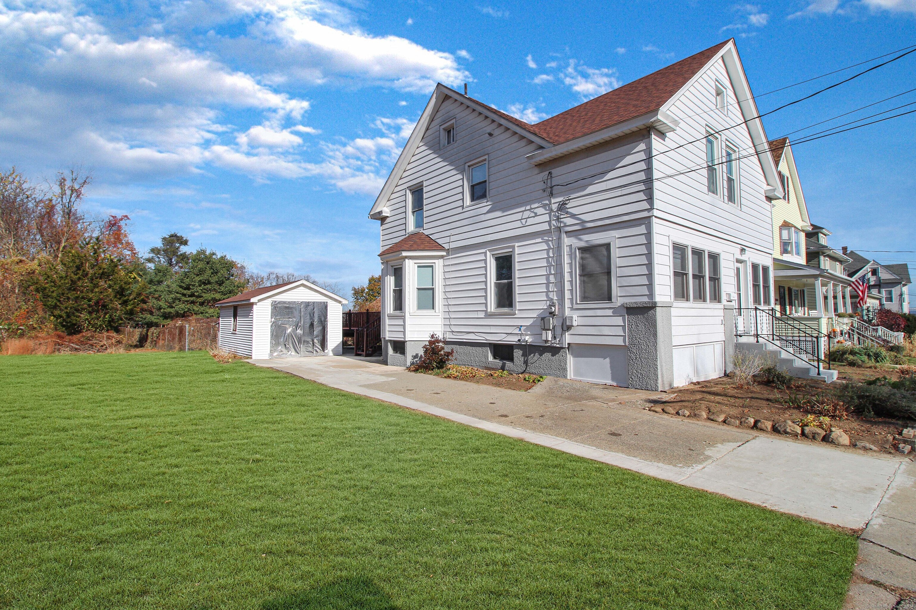 a view of a house with a yard