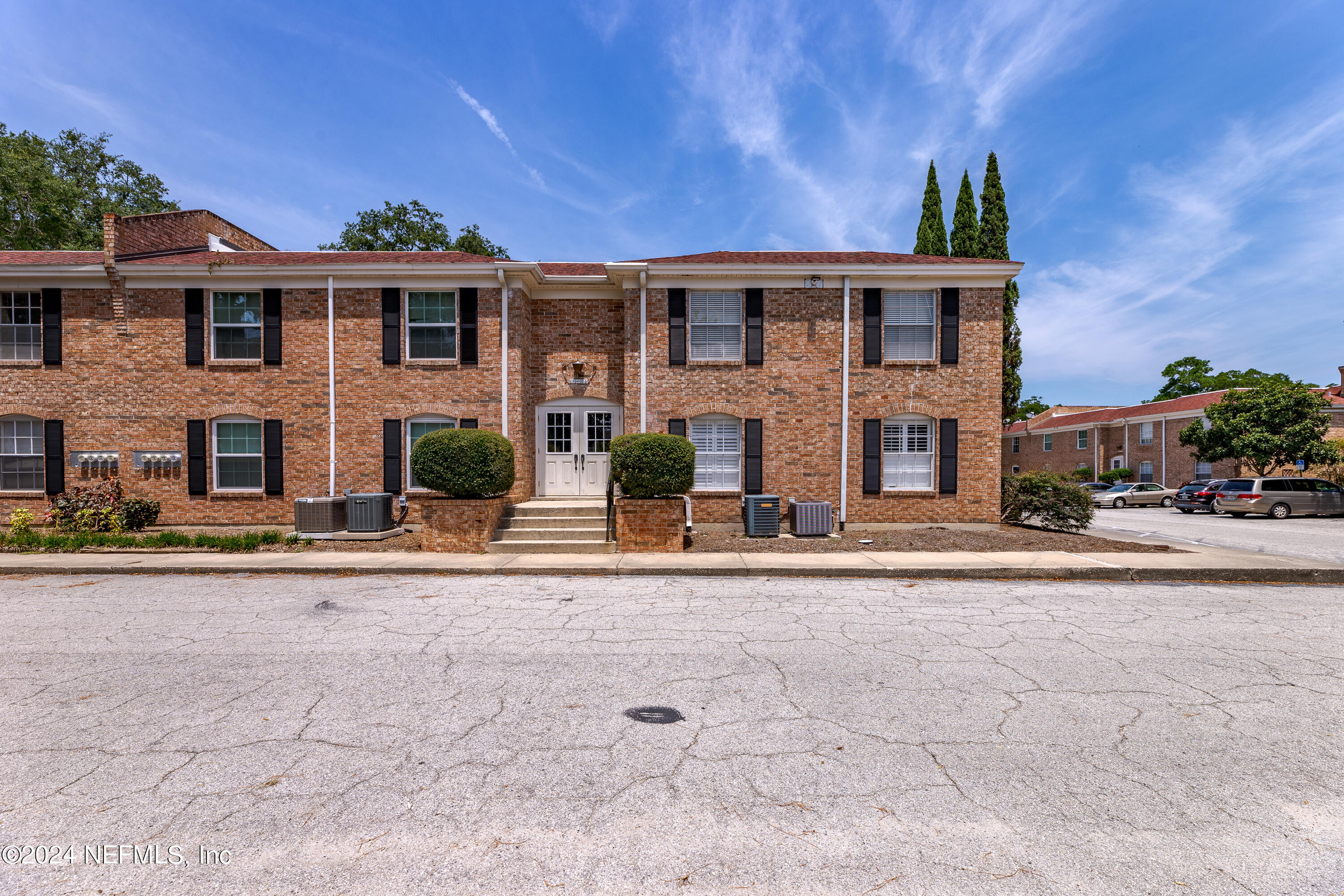 front view of a house with a patio