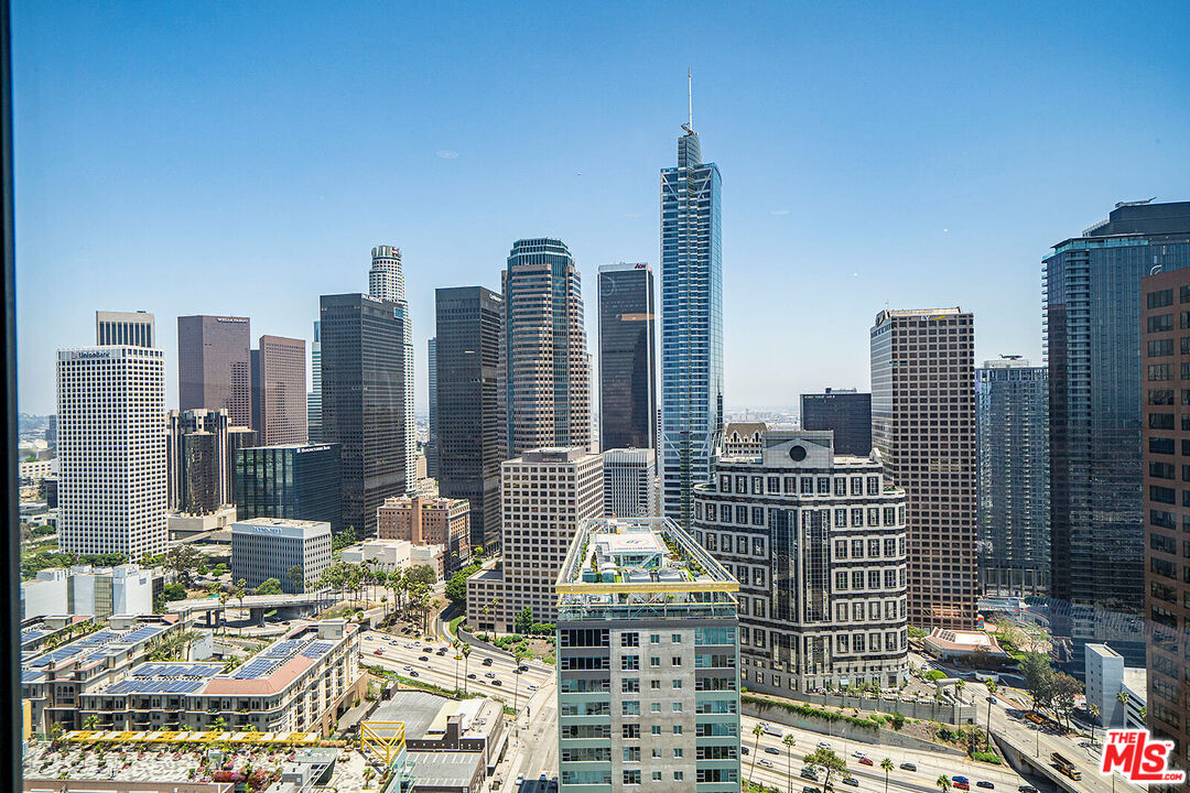 a view of city with tall buildings