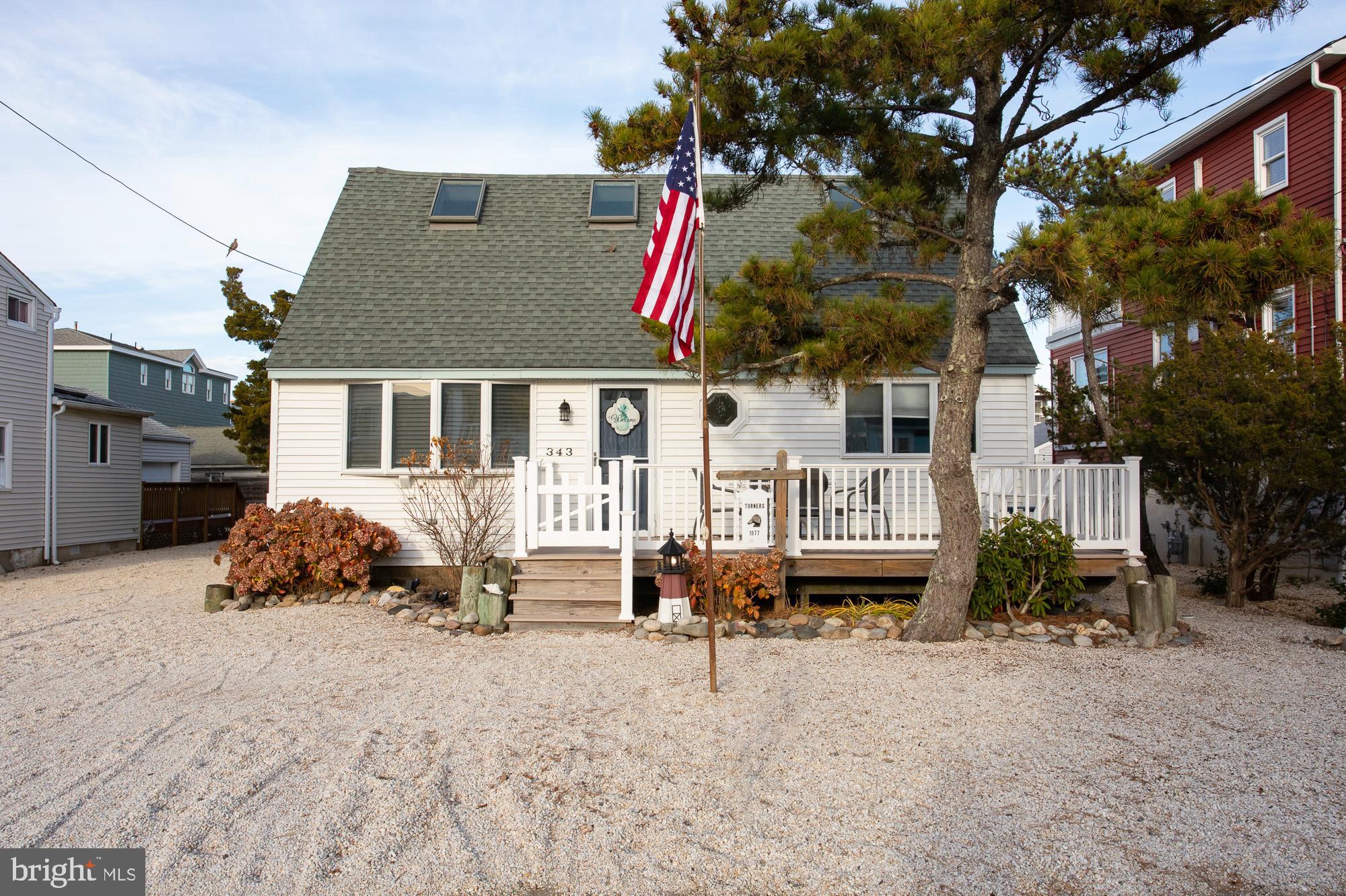 a front view of a house with entertaining space