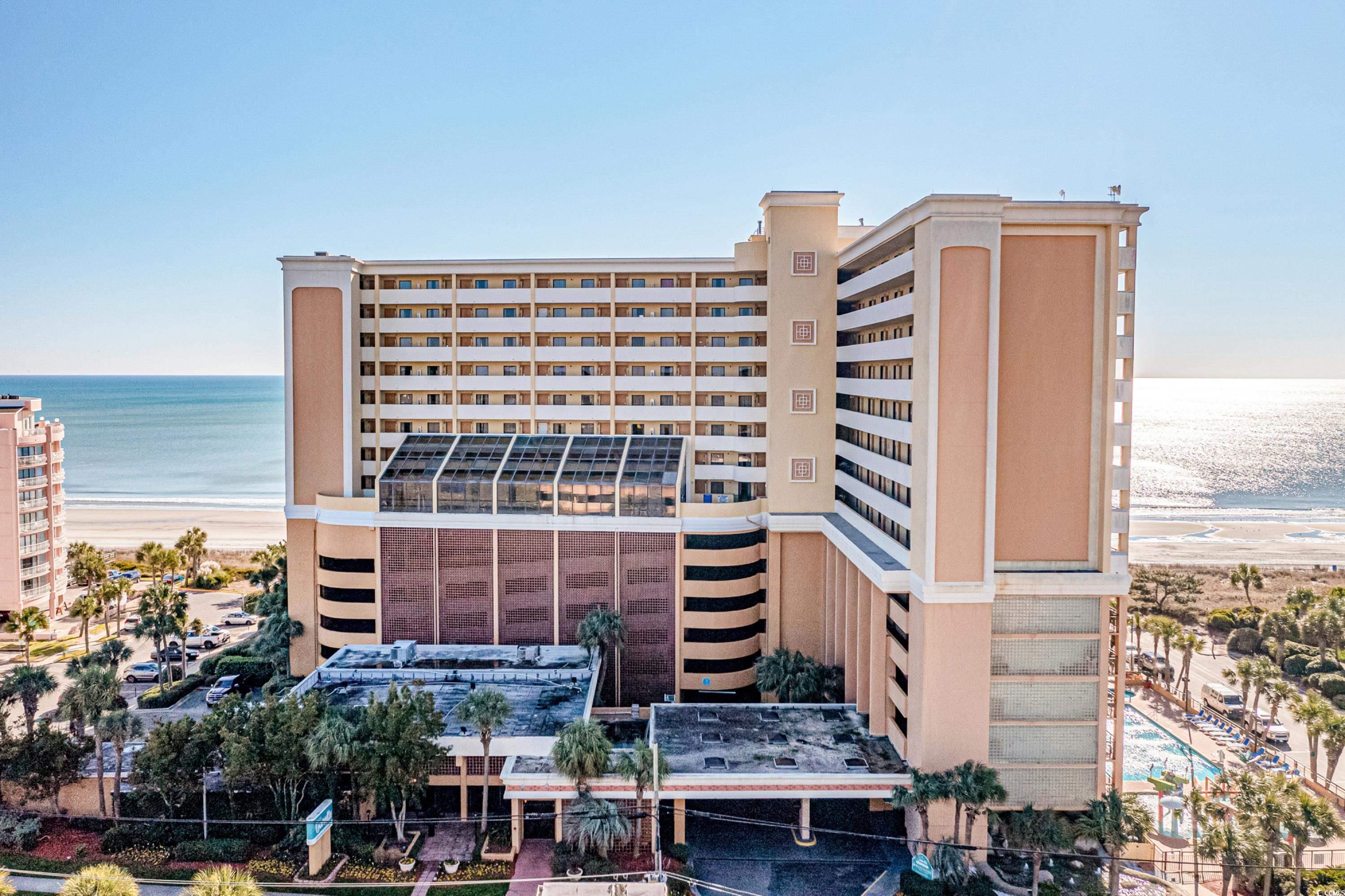 View of building exterior with a water view