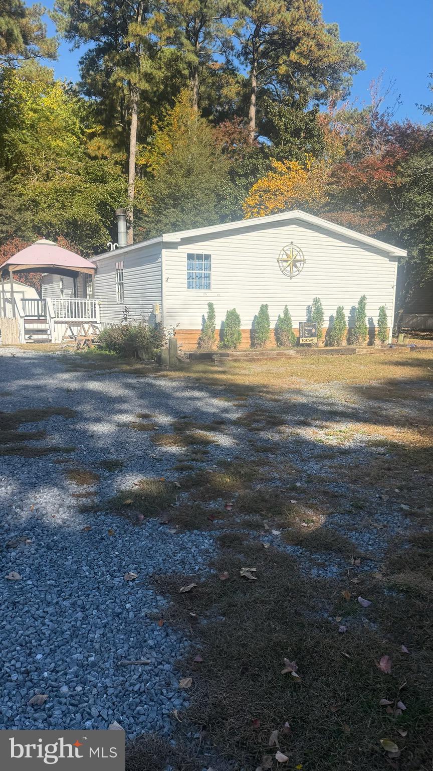 a view of a yard near an ocean