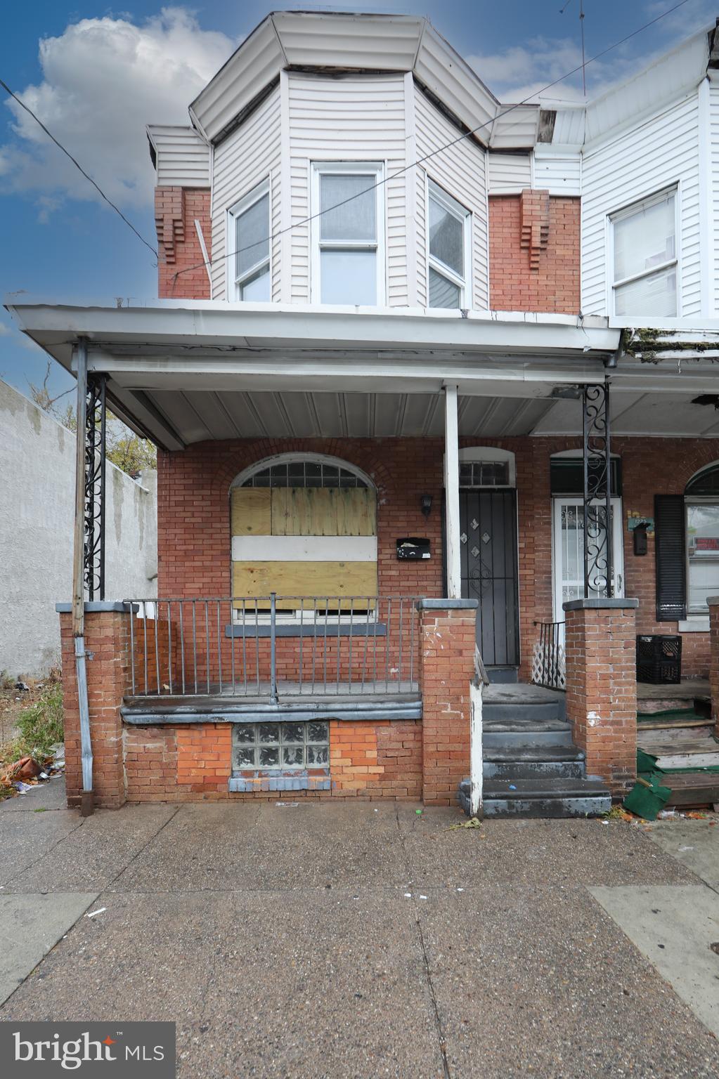 a front view of a house with garage