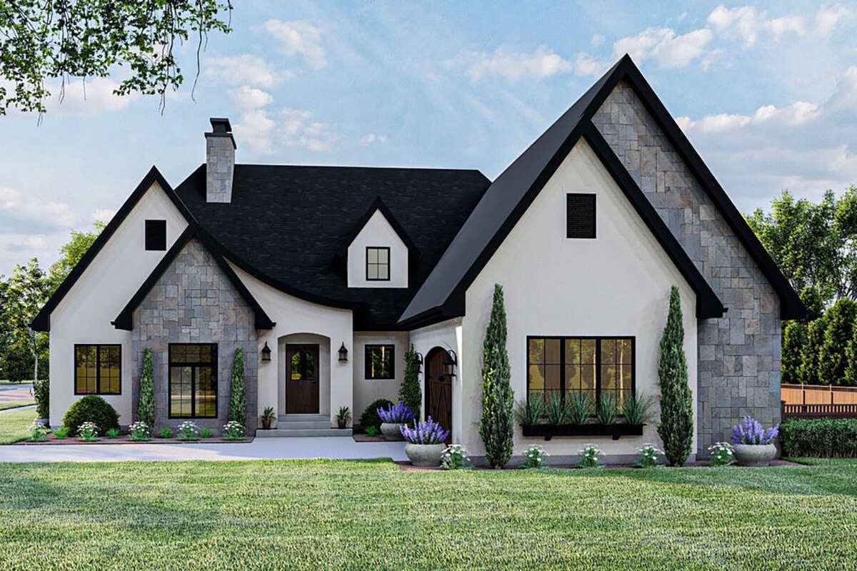 a front view of a house with a yard