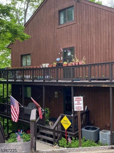 a view of a chairs and table in a patio