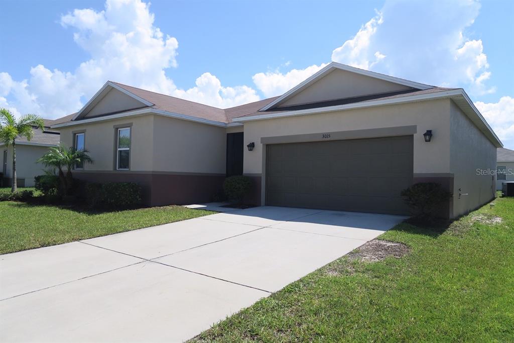 a front view of house with yard