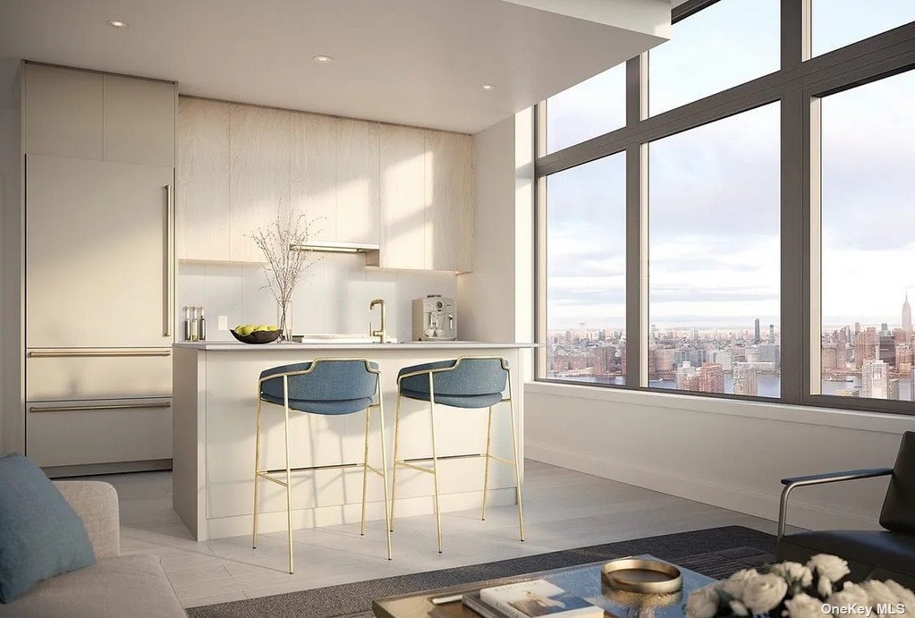 a kitchen with a sink and a refrigerator