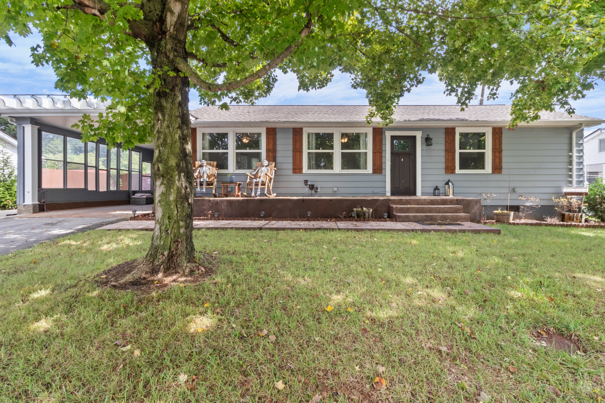 a front view of a house with a yard