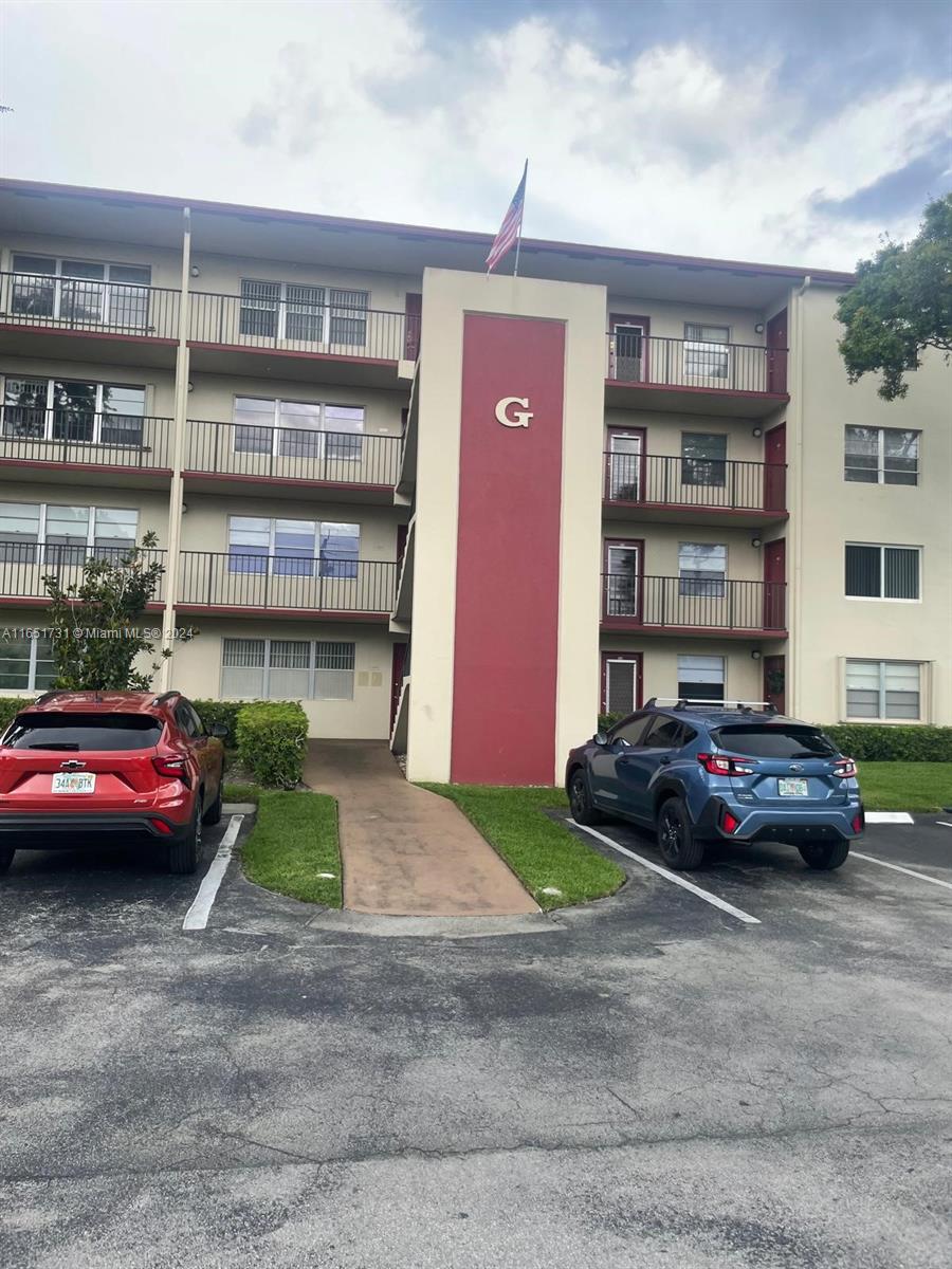 a cars parked in front of a building