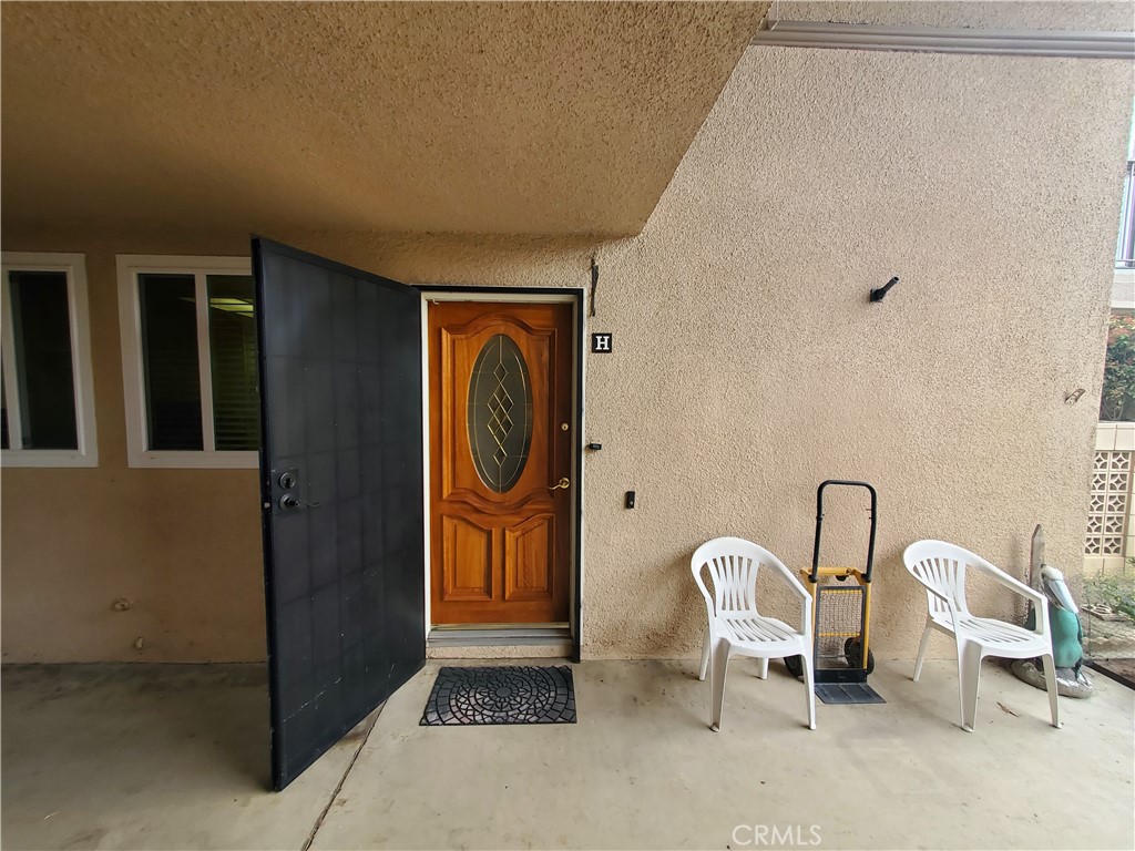 a front view of a house with dining area